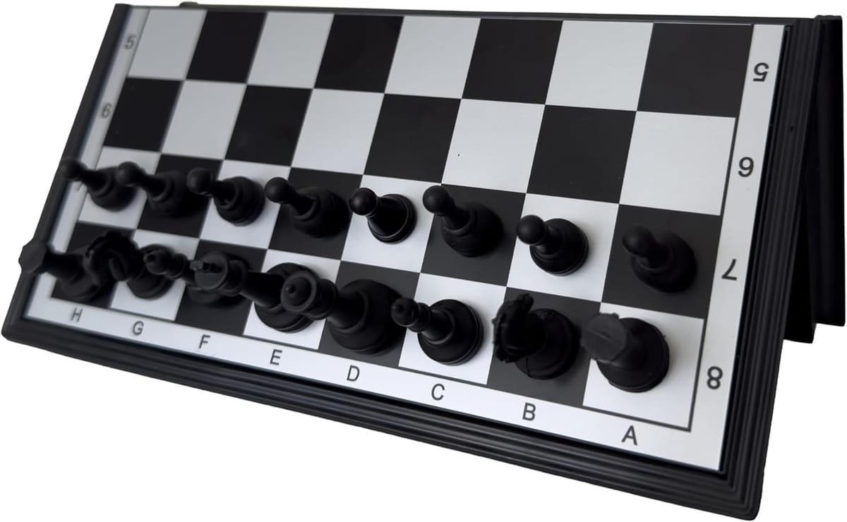 Black folding magnetic chess set.