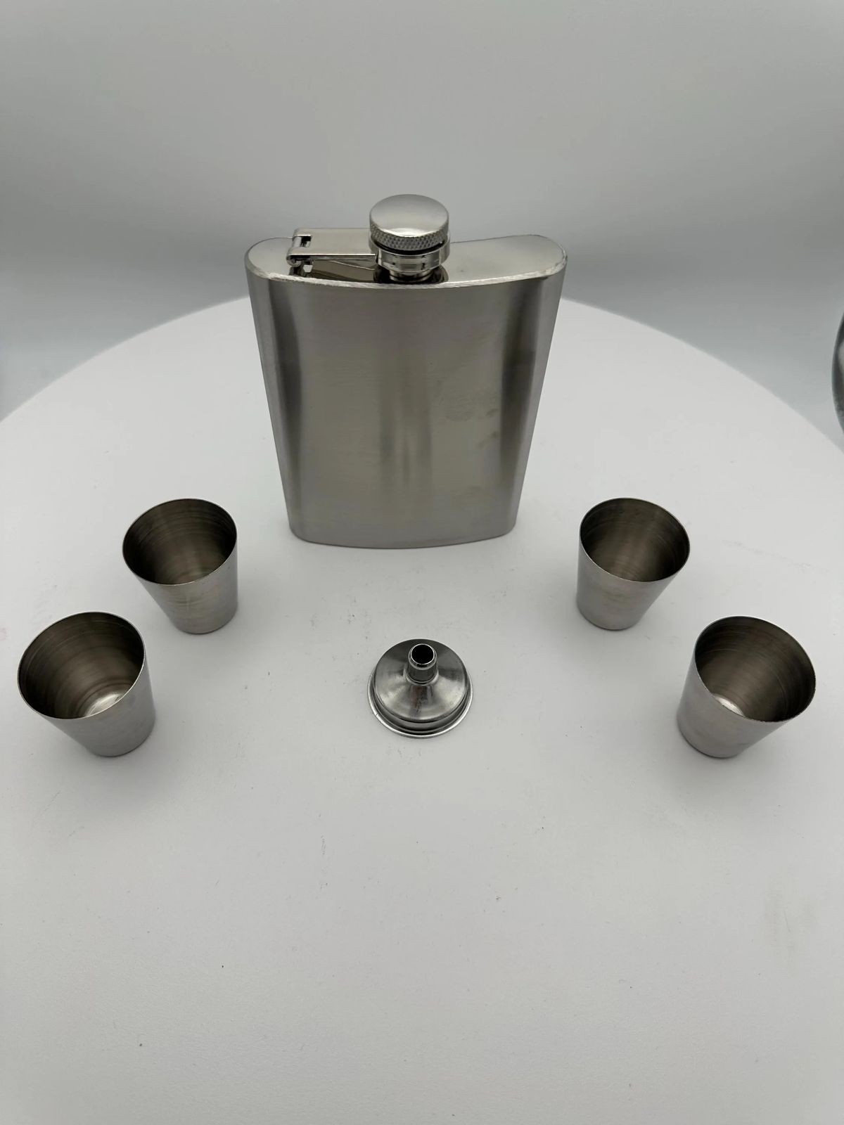 Silver flask four shot cups funnel.