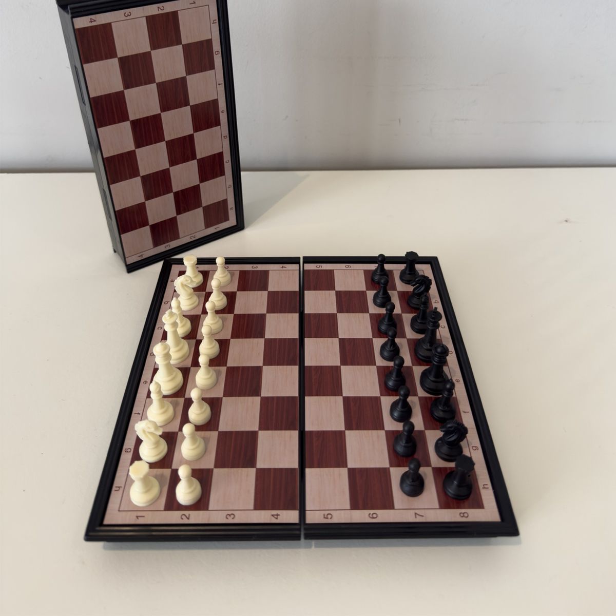 Brown chess set open board.