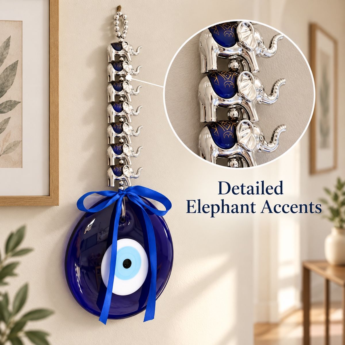 Close-up of the seven stacked elephant accents beneath the glass evil eye