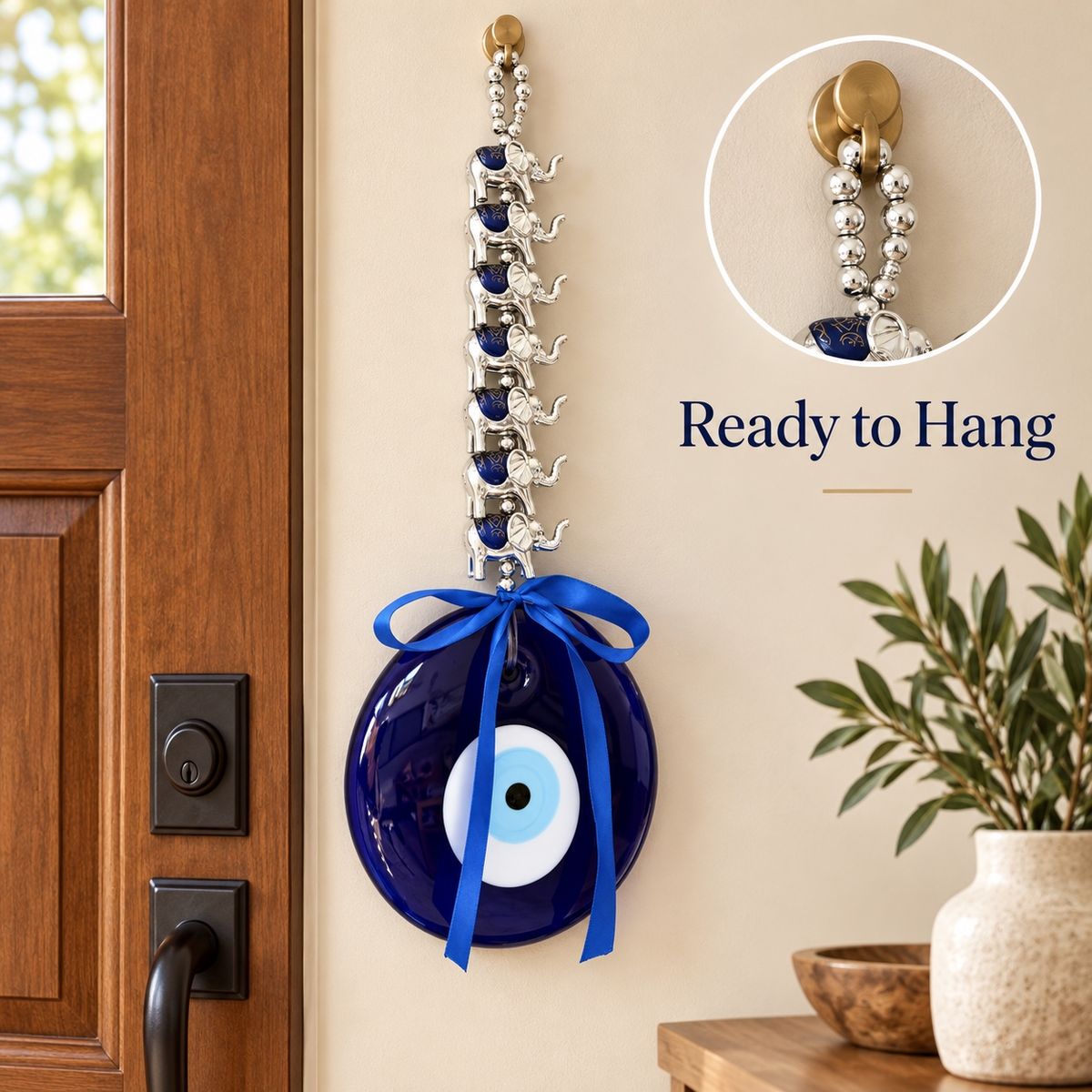 Ready-to-hang beaded loop and blue satin bow at the top of the wall hanging
